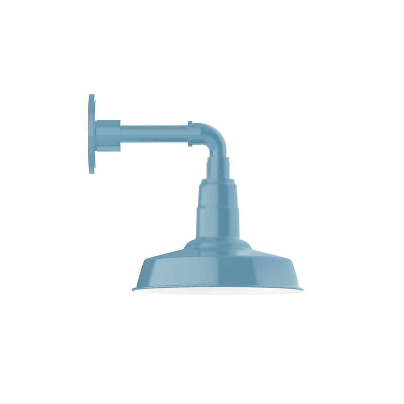 Light blue straight-arm wall light with curved backplate and bell shade