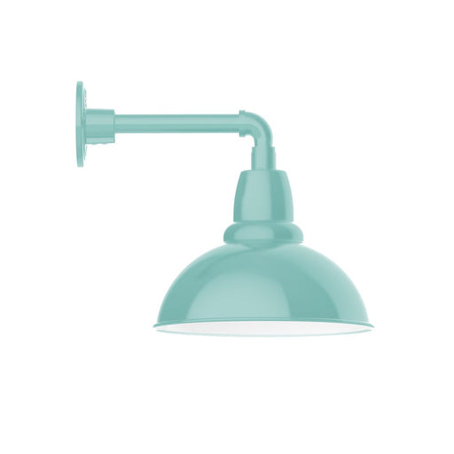 Sea green straight-arm wall light with dome shade and round wall mount backplate