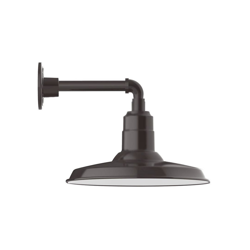 Architectural bronze wall sconce with curved arm and round bell shade
