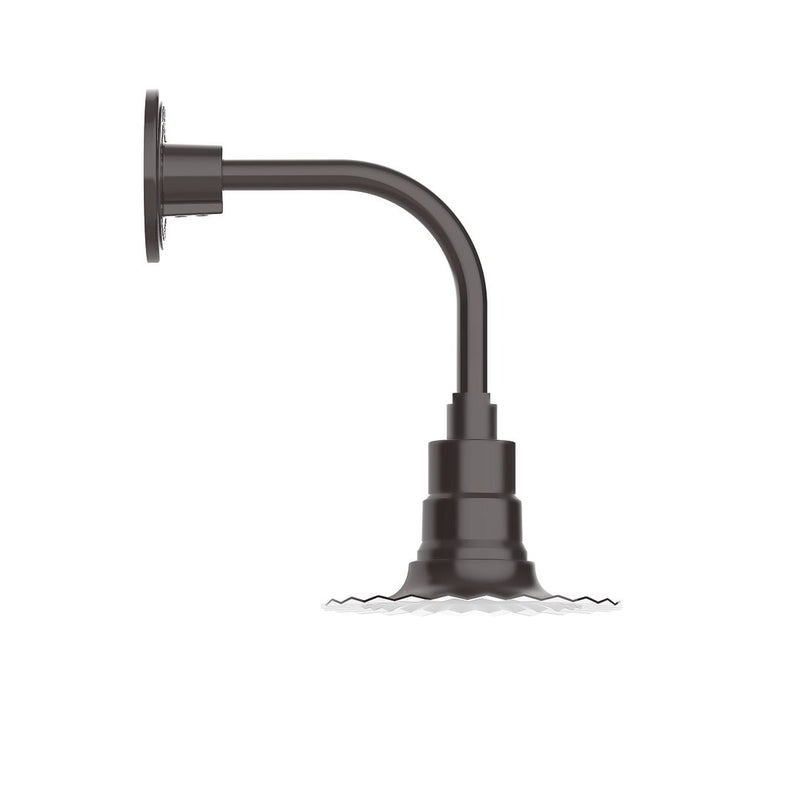 Curved arm wall light with dark bronze finish and round mounting plate