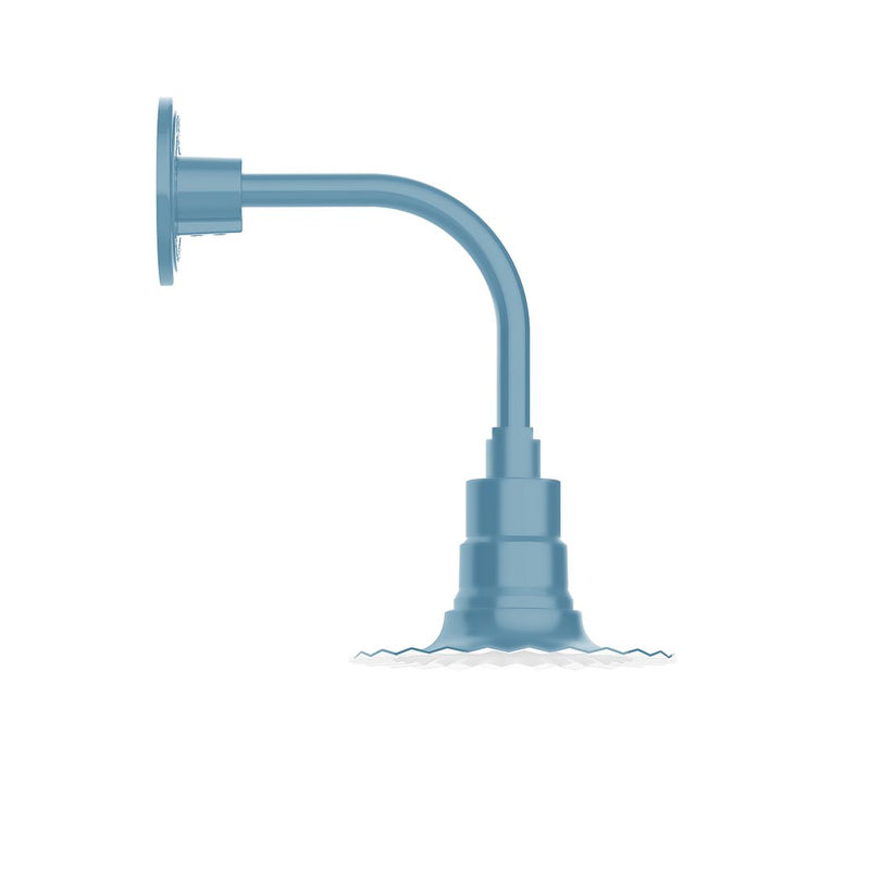 Light blue curved arm wall light with round backplate and cylindrical connector