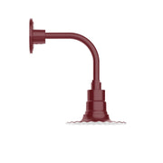 Barn red curved arm wall light with round backplate and ribbed arm