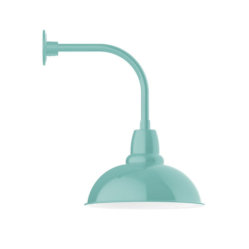 Sea green curved-arm wall light with dome shade and wall mount base