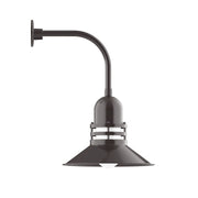 Architectural bronze curved-arm wall light with flared shade and ring detail