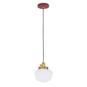 Uno pendant light with barn red canopy, brushed brass hardware, and white glass shade