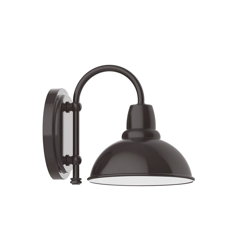 Architectural bronze wall sconce with arched support and dome shade