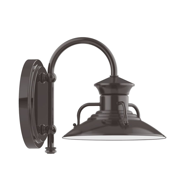 Architectural Bronze wall light with curved arm and conical shade, exposed support