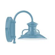Light blue wall light with arched backplate and lantern-style shade