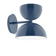 Navy two-shade wall sconce with round backplate and adjustable arm