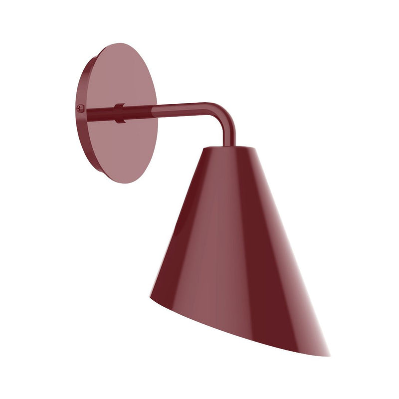 Barn red wall sconce with round backplate and angled cone shade