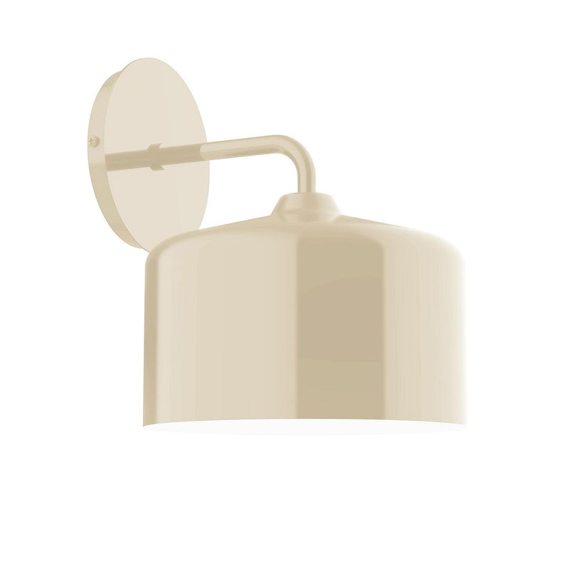 Cream wall sconce with curved arm and cylindrical dome shade