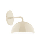 Cream LED wall sconce with curved dome shade and short arm mount