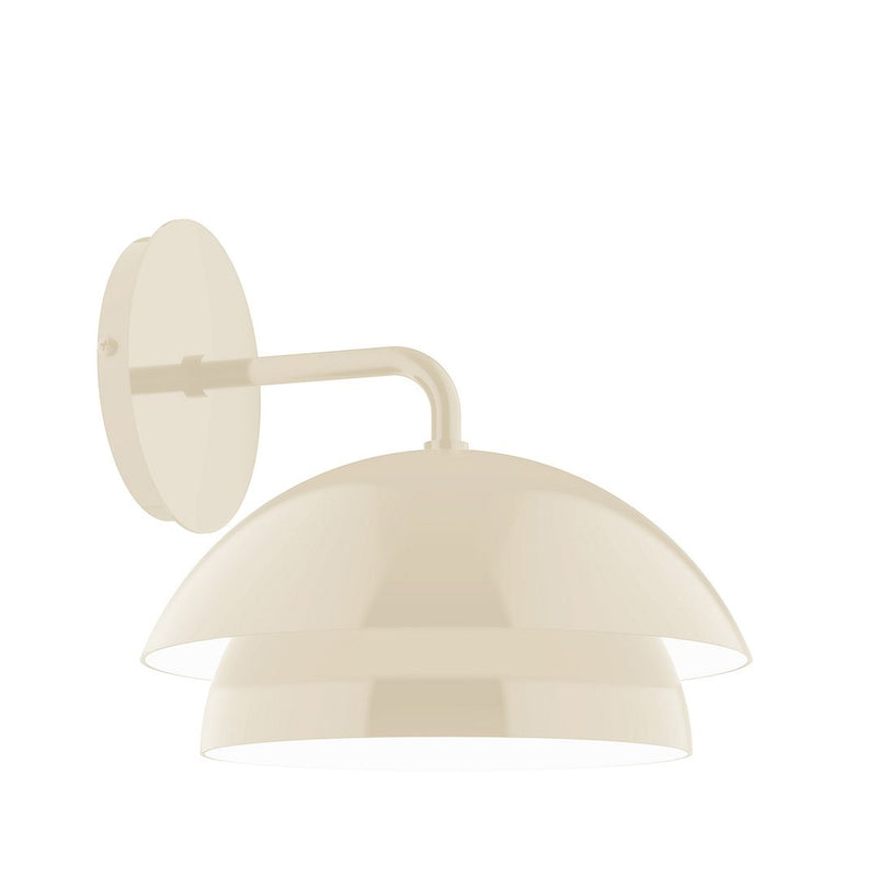 Cream wall sconce with curved arm and dome shade, round backplate