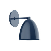 Navy wall sconce with round backplate and dome metal shade on a horizontal arm
