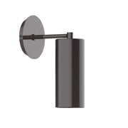 Architectural bronze wall sconce with round backplate and cylindrical shade, short arm