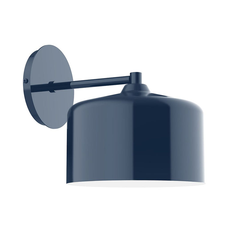 Navy wall sconce with round backplate and short cylindrical shade