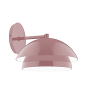 Mauve wall sconce with dome shade and backplate