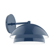 Navy wall sconce with arched double-shade and round backplate