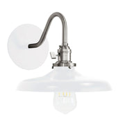 Wall sconce with white backplate, brushed nickel arm, and frosted glass shade