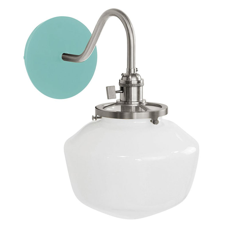 Sea green wall sconce with brushed nickel arm and white glass shade.