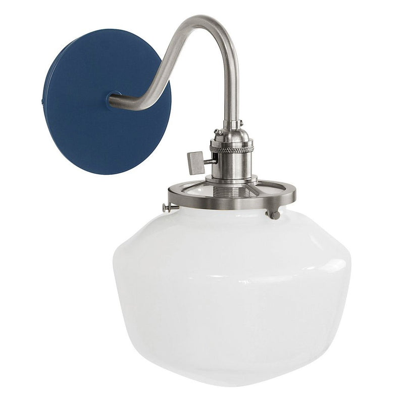 Navy wall sconce with brushed nickel arm and white glass shade