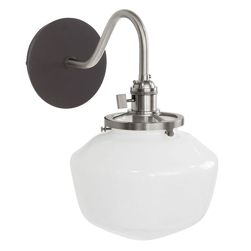 Architectural wall sconce with dark backplate, brushed nickel arm, and white glass shade