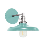 Sea green dome wall sconce with brushed nickel arm and frosted glass bulb