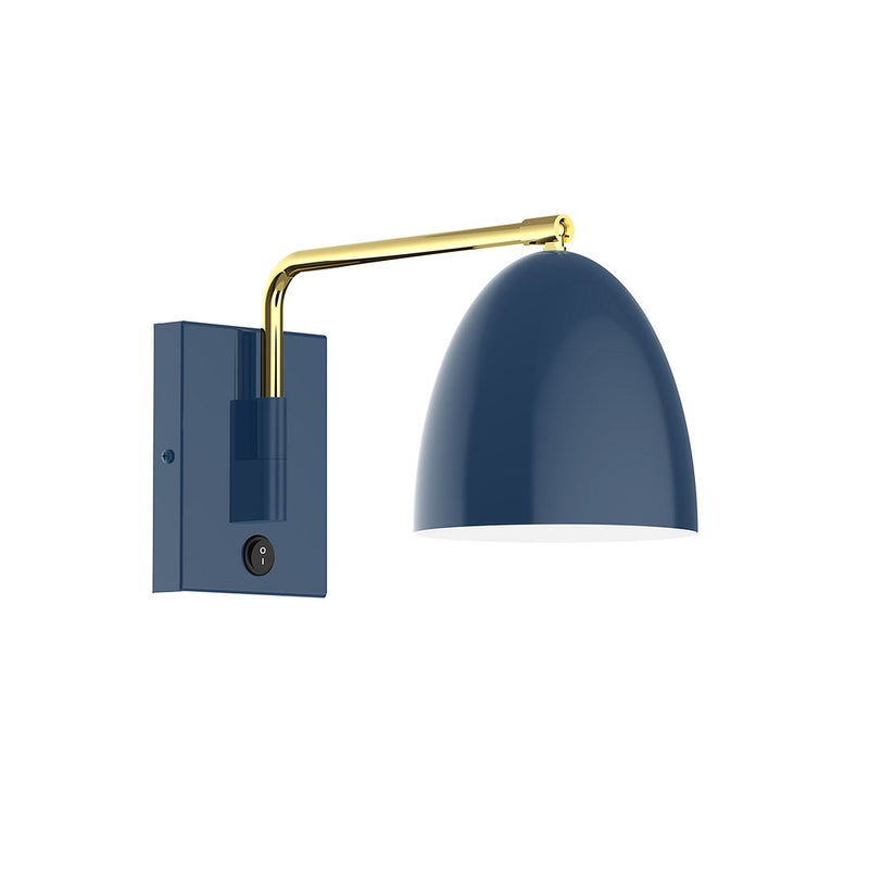 Navy swing-arm wall light with domed shade, brushed brass arm, and wall switch