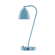 Light blue table lamp with arched metal stem and dome shade