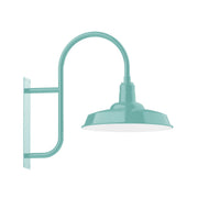 Sea green wall mount light with arched gooseneck arm and domed shade