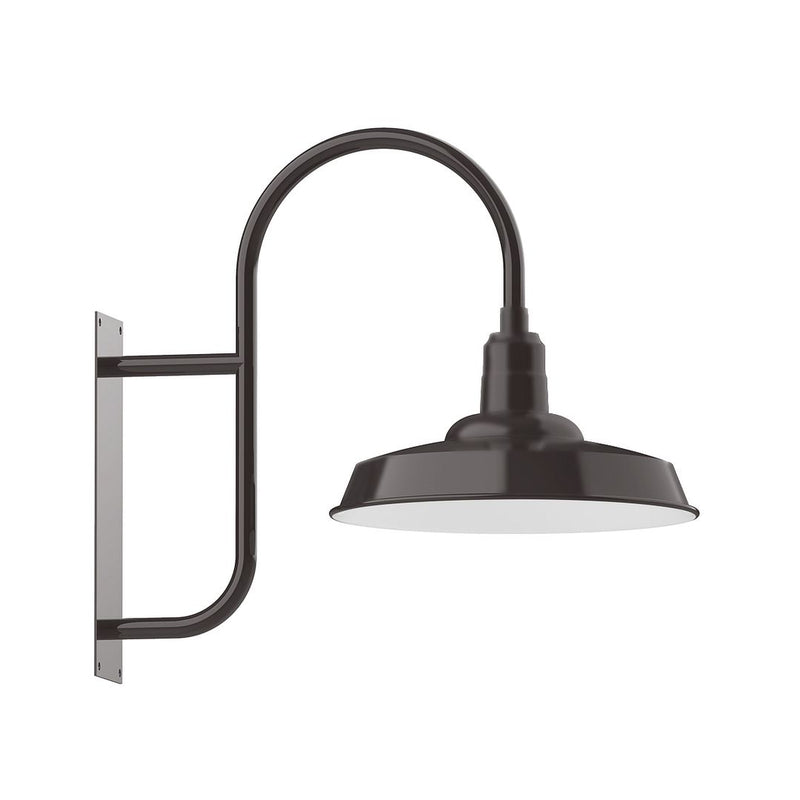 Architectural bronze wall mount light with curved arm and bell-shaped shade